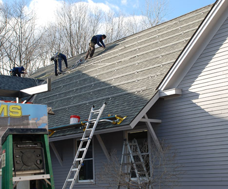 Revision Energy installing roof braces