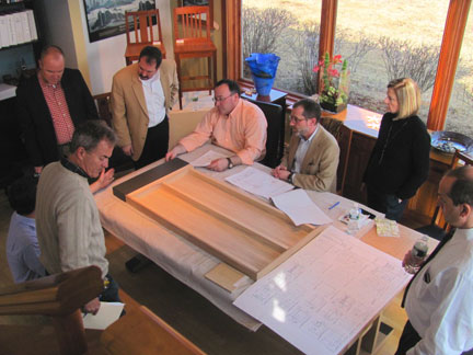 Discussing the study carrel design in our showroom