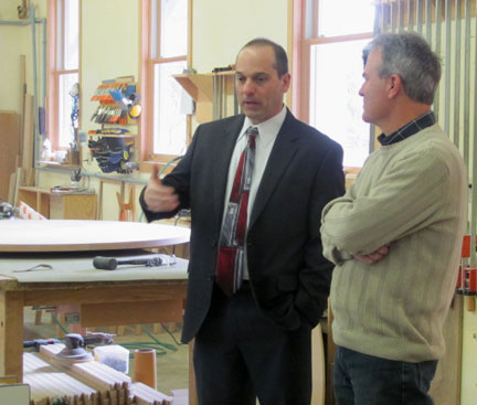 Bill talks with the contractor's Project Manager during shop tour