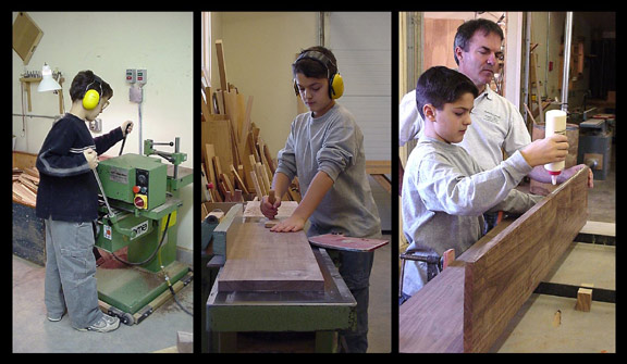 Collin Huston, Bill Huston's son, learns to cut and glue table parts in 2002
