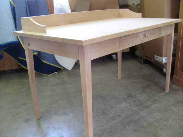 Custom writing desk makes its way out of the Huston & Company workshop into the finishing shop.