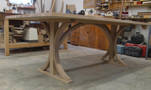 A stunning custom handcrafted solid oak table by Huston and Company, Maine