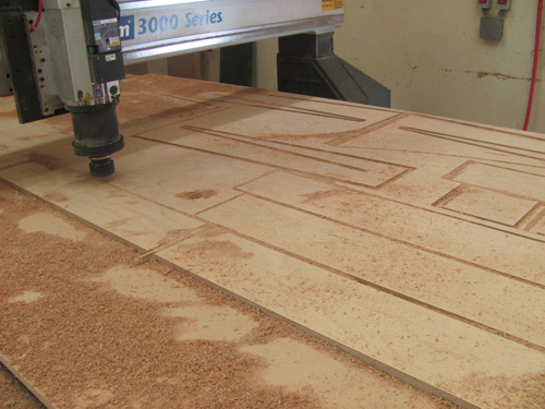 The CNC at Huston & Company, cutting speaker parts for Collin Huston