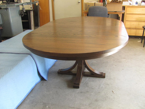 Gorgeous pedestal extension dining table, solid oak, by Huston and Company