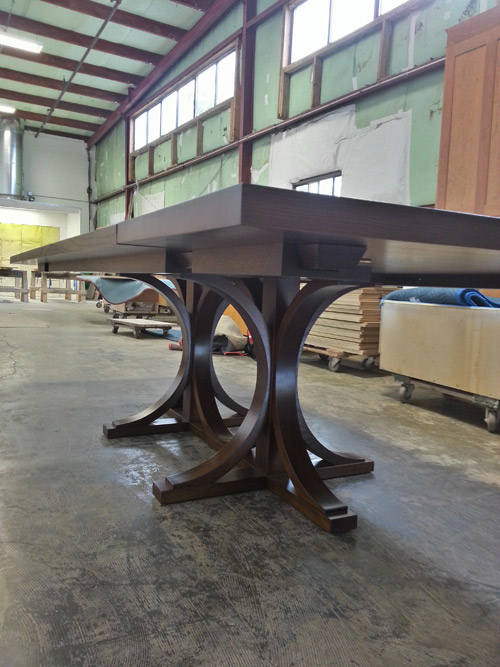 Impressive solid oak dinig table designed and handcrafted by Huston and Company
