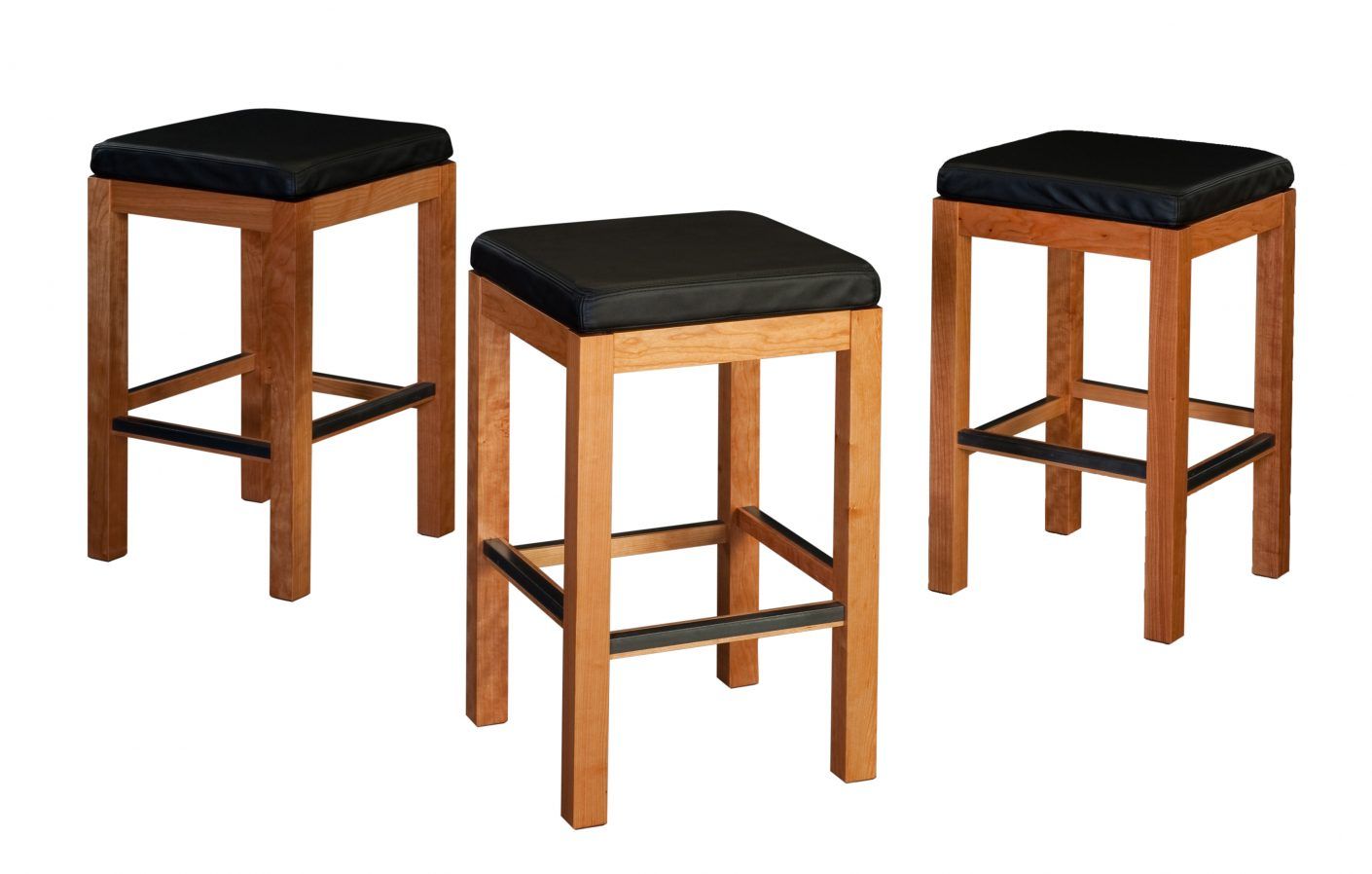 Colby Stools. Shown in cherry with black leather.