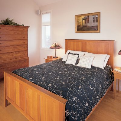 Cliff Island Bed, Davenport Tall Chest and Jp End Tables. Shown in cherry.