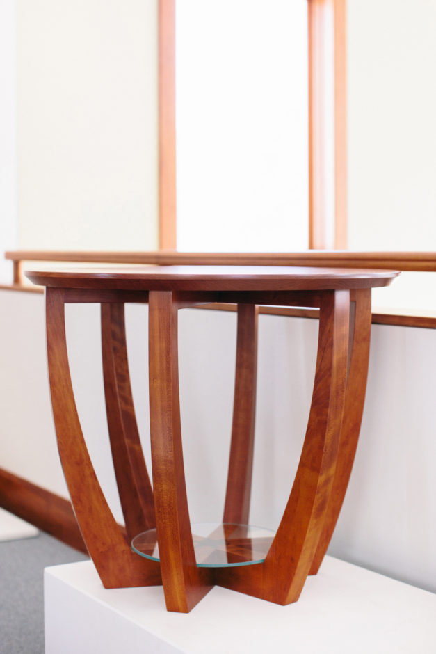 Curva End Table, shown in cherry.