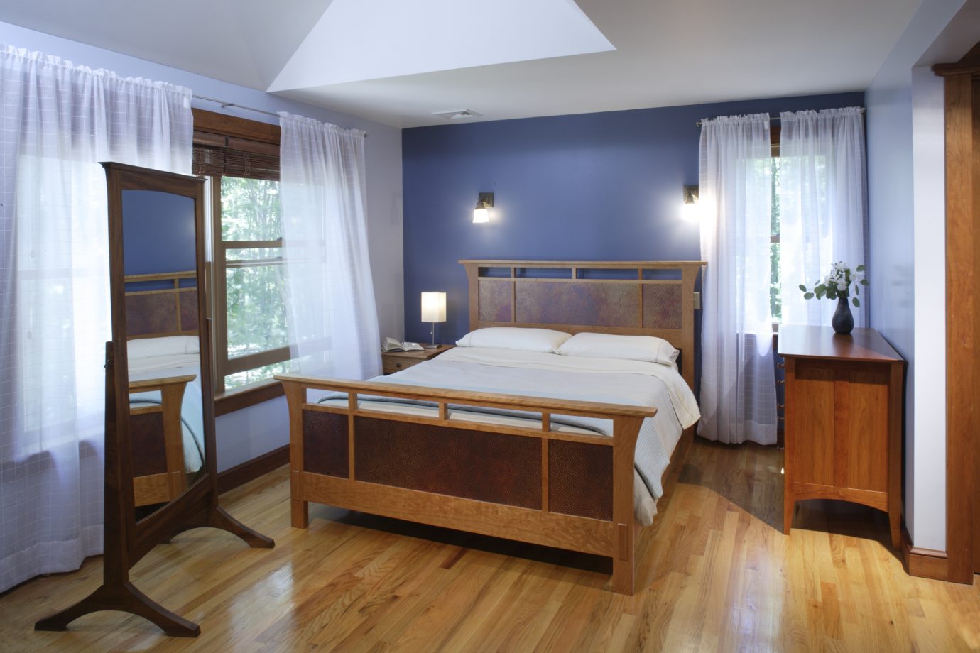 Duo Bed and Davenport Bureau in cherry. Standing mirror in walnut.