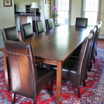 Custom Element Table, rectangular, in walnut with wenge details.