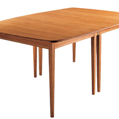 Wilson Extension Table, closed. Shown in cherry with maple inlay.