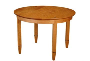 Element Table, round. Shown in cherry with wenge details.