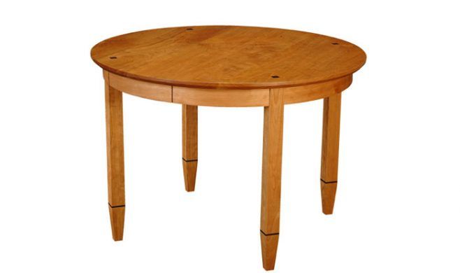 Element Table, round. Shown in cherry with wenge details.