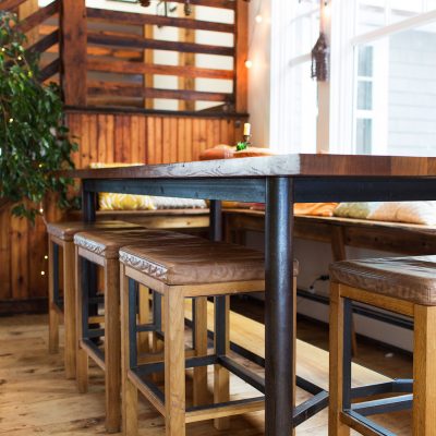 Custom dining table with custom Colby Stools.